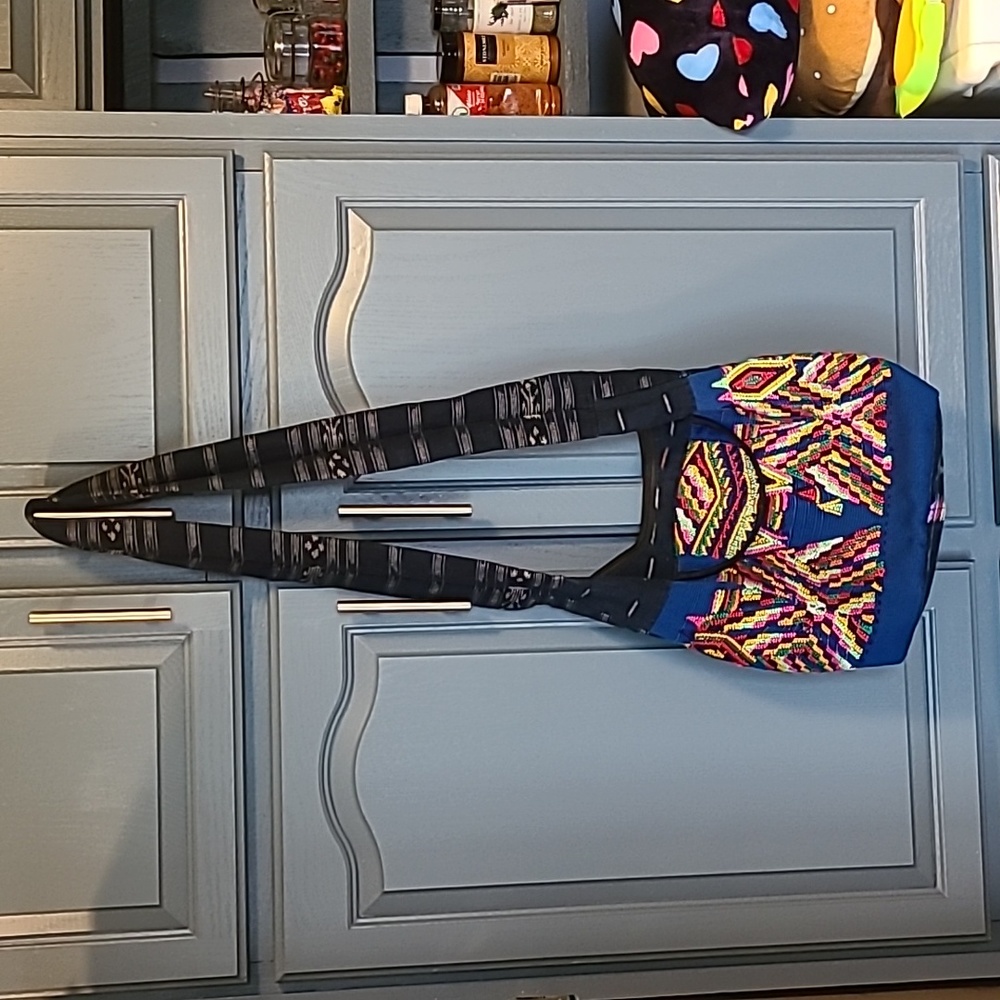 Like new fun handbag.  Lovely patterns.